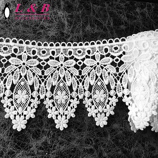 Hva er Embroidery Lace og hvordan lages det?